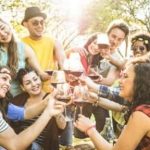 A group of people with wine in their hands.