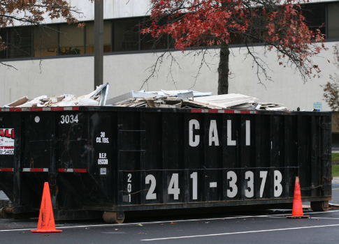 Dumpster filled with trash