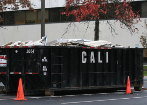 10-yard dumpster full of waste