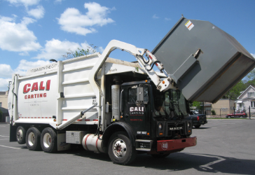 10yardcontainer-image Trash being loaded onto truck