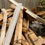 pile of scrap wood in residential yard