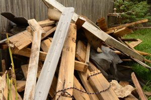 pile of scrap wood in residential yard